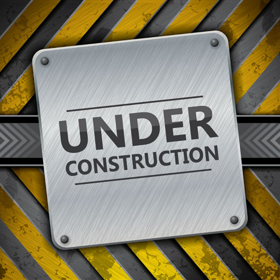 metal under construction sign